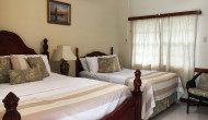 105 with 2 beds - deluxe double -1 queen bed, 1 double bed 06